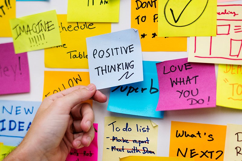 Sticky notes on an office wall Positive Thinking Exercises for Students | Boost Mental Health